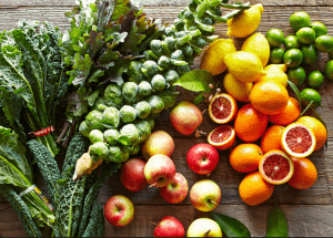 a group of fruits and vegetables on a wood surface Healthy Weight Loss Diets Alton
